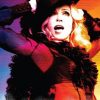 Madonna in postura de jurnalist
